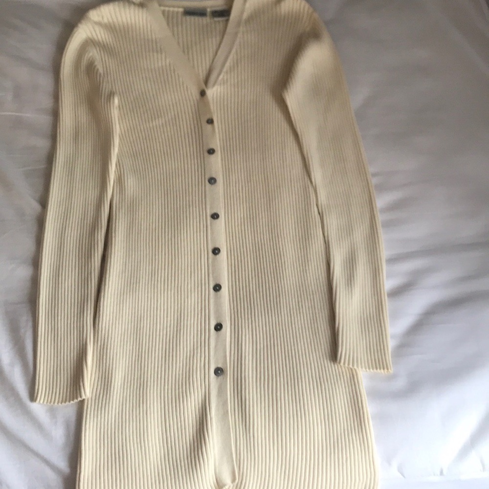 Button down sweater falls above the knee